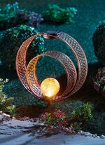 Solarleuchte aus Metall in Rostoptik mit Glaskugel 