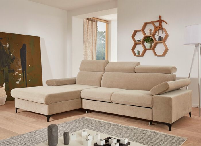 Polsterecke mit Bettfunktion und Bettkasten in der Ottomane 